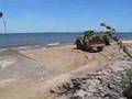 beach cleaning by excavators