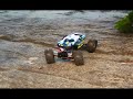 AXIAL SCORPION AX10 CRAWLING ON STEEP ROCK