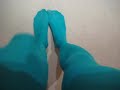 Feet in Green Pantyhose Tights