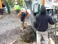 Concrete Dump Truck pouring the front log entrance