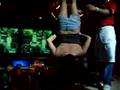 Girl in skirt spun upside down after shots of tequilla