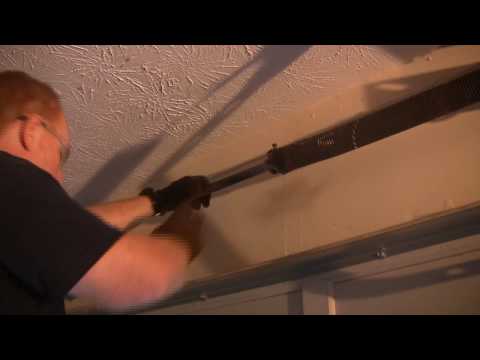 how to repair the spring on a garage door