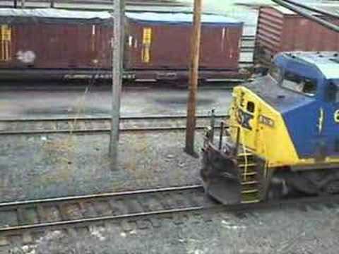 A westbound CSX COFC pulls through ...