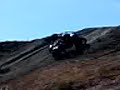 buggy's racing up  a mountain