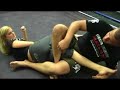 Frank Mir demonstrates the kneebar on Joanne of MMA Girls