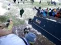 New York Jets Shaun Ellis throws snow boulder at Pesty Seahwak Fan