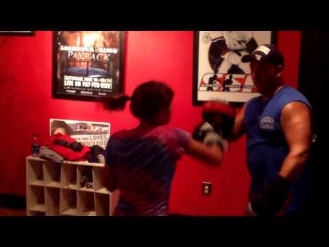 SSF Submission Academy - 12 year old Emma working the mitts with Coach Darryl Tomlin.