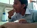 Boy eating and talking importance of food in life (look his health & how much he eat)
