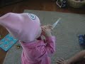 arilyn sporting her cute pink packers hat that daddy bought for her:)