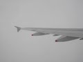 climbing out of cdg on a delayed ba flight to lhr, a soft-spoken but sweet ba flight attendant makes an annoucement, putting passengers at ease. registration g-euxi