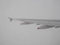 climbing out of cdg on a delayed ba flight to lhr, a soft-spoken but sweet ba flight attendant makes an annoucement, putting passengers at ease. registration g-euxi