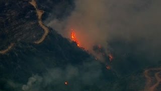 Hundreds of new evacuations across West as wildfires surge