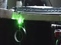 125mW green laser burning tape and match