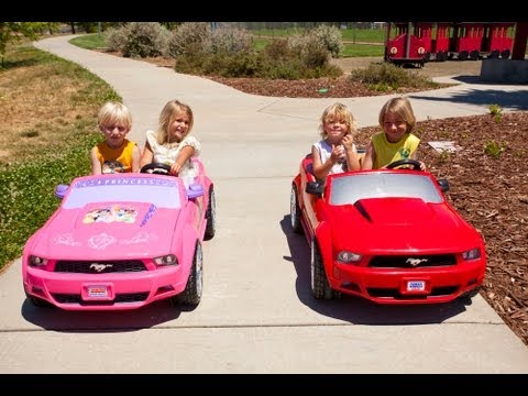 Sidewalk - We finally match up the two stock Power Wheels Mustangs for another kids ride on car race... the standard Ford Mustang vs the Disney Princess Ford Mustang! C...