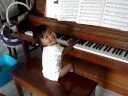 Addi plays the piano
