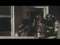 Fire spreads though row homes