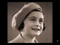 Anne Frank's father had a camera but, starting in 1942, the Nazis forbade Jews from using cameras, which explains why there are no known photos of Anne after 1942. A number of the photos here are passport photos but their family was trapped in the country by 1942 (it's understandable they stopped getting passport photos taken, too). The photo albums were rescued, with Anne's diaries and other personal effects, by Miep Gies, a friend of the family's who worked for Otto Frank. You can send Miep birthday cards and other letters, care of the Anne Frank House, Amsterdam. She will turn 98 in February (2007).