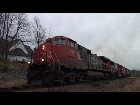 2660 - CN 2660 leads the daily eastbound freight (A406) through Rothesay, NB. CN 2660 leads CN 5756, CN 9416 and CN 2431, a nice 4-unit lashup. Taken at mile 78 of ...