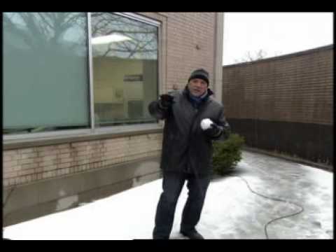 TV Reporter Nails Stagehand with Snowball Video