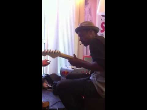 Bastien Salabanzi playing guitar!