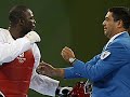 l'atleta cubano angel valodia matos ha dato un calcio in testa all'arbitro che dirigeva l'incontro di taekwondo contro il kazako arman chilmanov

watch the video here !! a cuban taekwondo athlete and his coach were banned for life after angel matos kicked the referee in the face following his bronze-medal match disqualification. cuban coach leudis gonzalez offered no apology for matos' actions during the men's over-80 kg (176 pounds) match.

matos was winning 3-2, with 1:02 in the second round, when he fell to the mat after being hit by his opponent, kazakhstan's arman chilmanov. he was sitting there, awaiting medical attention, when he was disqualified for taking too much injury time. fighters get one minute, and matos was disqualified when his time ran out.

matos angrily questioned the call, pushed a judge, then pushed and kicked referee chakir chelbat of sweden. matos then spat on the floor and was escorted out.

