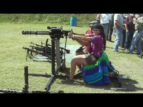 The minigun - Tori Nonaka (15) Firing the Minigun at the 2010 IDPA National Championship.