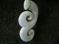 beef bone double spiral whale tail pendant