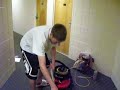Jamie vacuuming the floor
