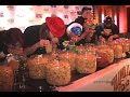 Ever wonder how fast you could eat a tub of pork rinds? Join us as we follow Major League Eater Pretty Boy Pete Davekos as he gets set to devour tubs of pork rinds in the World Pigskin Eating Competition. Presented in Taste-o-vision! For more behind the scenes videos check us out at www.presspass.tv