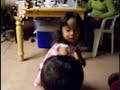 My two-year-old niece tries to teach my one-year-old nephew the Otso-Otso dance.  Not quite exactly the dance, but cute.
