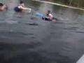 Two Canoes, a Kayak, and a Camera