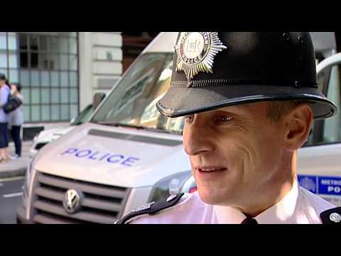 Play Video - Police: In the Line of Fire