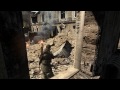 [Released May 1, 2012] On this episode of First Impressions, I take a look a the 2012 remake of the 2005 tactical stealth/sniper game set in WW2, Sniper Elite V2. In the game you are an American OSS Sniper deployed to Berlin during the last days of the fall of Nazi Germany, in order to secure German scientists involved with the creation of the V2 rockets. The actual game-play revolves around sneaking around areas of ruined Berlin to take out various Nazi and Soviet officers, both to prevent the Russians from obtaining the scientists and their work, and to retrieve intel from the Nazi's on the locations of the scientists. You spend much of the time patiently crawling around to set up traps (something I'm evidently terrible at) and getting into an ideal sniping position. One of the games neater little features in a bullet cam that follows your better shots, culminating in a brutal display of what exactly your bullet is doing to your targets anatomy. Overall, it's an interesting game that asks you to be stealthy but doesn't overly penalize you for failing to do so.