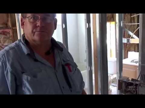 how to locate wood behind drywall