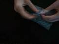 Coin through bag- performance and tutorial :: A neat magic trick.