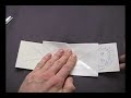 Saw a paper woman in half Saw a paper woman in half