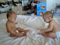Twin baby boys have a conversation