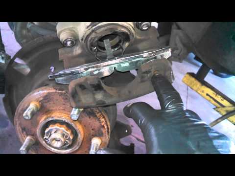 Front brake pad replacement 1993-1998 Jeep Cherokee Wrangler pads Install Remove Replace How to