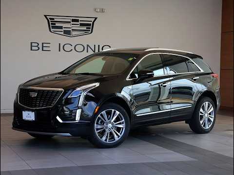 Certified Used 2023 STELLAR BLACK METALLIC Cadillac AWD Premium Luxury image 1