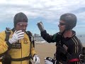 chicago air & water show, actor vince vaughn tandem jumps with the golden knights from 13000 feet and lands on the beach to start the air show. he exited the aircraft with ssg joe abeln and members of the gold demonstration team. the photographers are ssg jon ewald and ssg aaron figel.