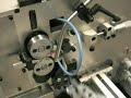 C411O With Gripper Making Torsion Spring.wmv C411O With Gripper Making Torsion Spring.wmv