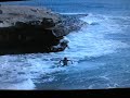 Cliff jumping at the beach, 3ft of water