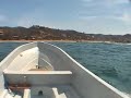 beaching a panga on shore in mexico beaching a panga on shore in mexico