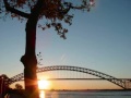 pictures taken at faber park on staten island, new york. multiple camera angles due to attempt to find the best photo.
 the sun sets behind the bayonne bridge over the kill van kull( waterway). the sun disappears behind port elizabeth new jersey. a few pictures of jet planes approaching newark liberty international airport.

muito obrigado a felix !

many thanks to f3xpgm's photography contest for inspiring me to take these photos.
