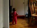 Riley walking in kitchen