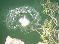 my friend jesse jumping off 50 feet quarry (cliff) in laval, quebec , canada.