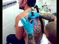 paco nirvana tatuando