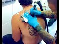 paco nirvana tatuando