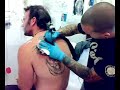 paco nirvana tatuando