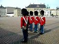 danish royal life guards in red gale uniforms - guard shift.
to celebrate the danish majesty queen margrethe the danish royal life guards wear their red gale uniforms -- 
daily they wear their black gale uniforms